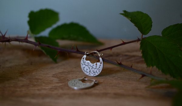 Bramble earrings on oak