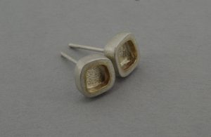 Silver and gold studs