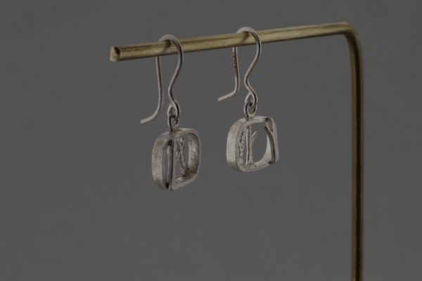 Side view of tree earrings