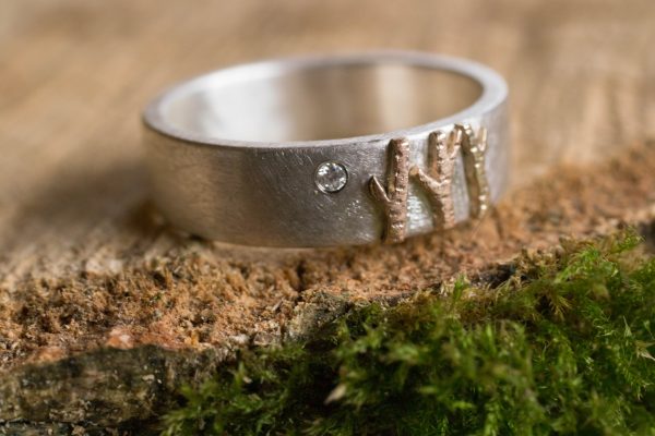 tree ring with diamond on wood